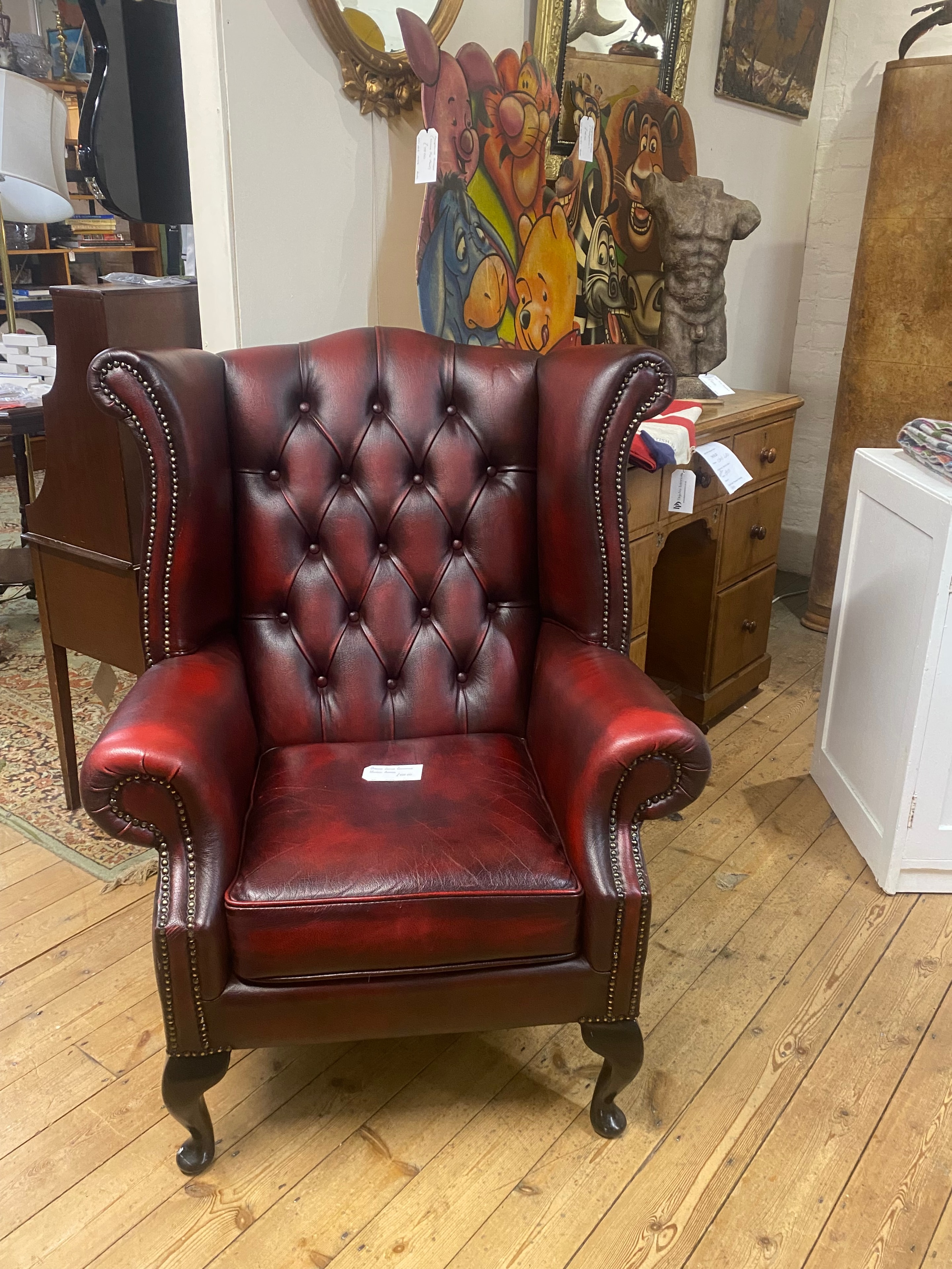 Leather Chesterfield armchair — one off pieces