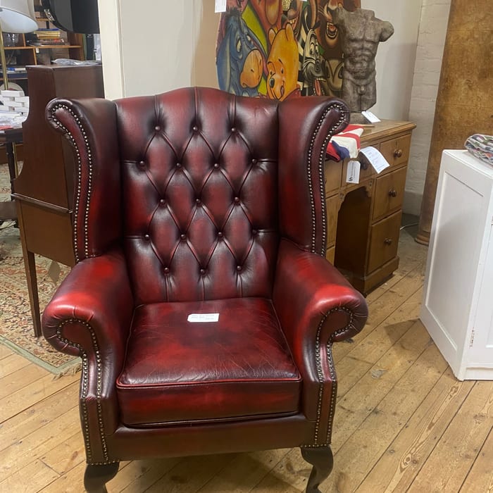 Leather Chesterfield armchair — seating